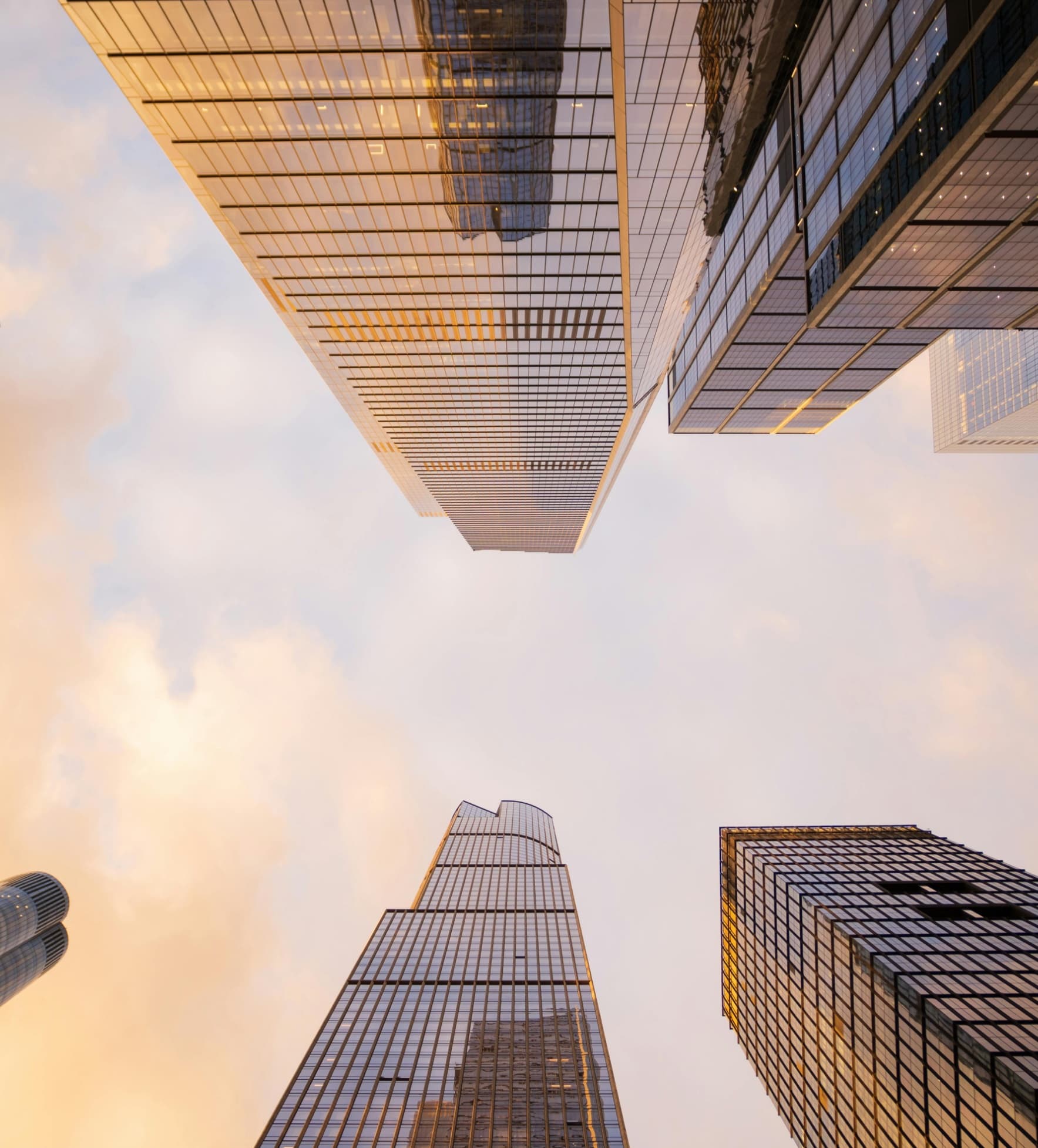 Modern skyscrapers viewed from below, representing corporate sustainability governance